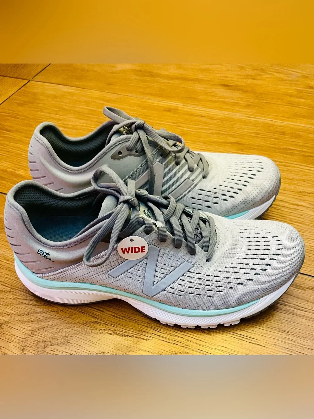 New Balance Women's Gray Athletic Running Sneakers with Mint Accent